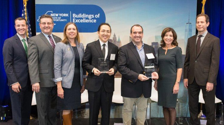 Members of the Tree of Life team accept the 2019 Building of Excellence Award.